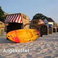 Angekettet, Strand im Sommer